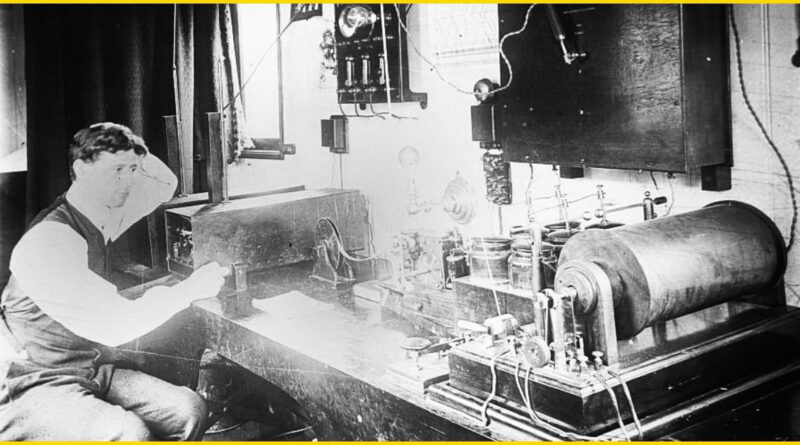 A Marconi Company wireless telegraph operator at his station aboard the passenger liner SS Deutschland in the early 20th century.